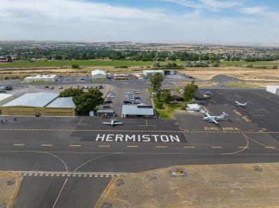 Hermiston airport with planes and helicopters on runway